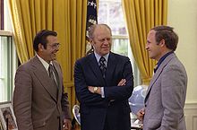 White House Chief of Staff Donald Rumsfeld (left) and his assistant Cheney (right) meet with President Gerald Ford at the White House, April 1975