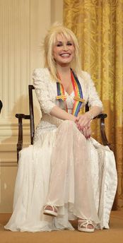 Parton during a reception for The Kennedy Center honorees in the East Room of the White House in Washington, D.C., on December 3, 2006.