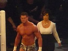 Ziggler (left), with his new look, and his manager Vickie Guerrero in April 2011.