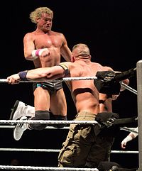 Ziggler performing a stinger splash onto John Cena.