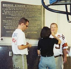 Carey preparing for a TV broadcast at the dedication of Cleveland Browns Stadium, September 1999