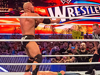 The Rock preparing to execute the People's Elbow on John Cena at WrestleMania XXVIII.