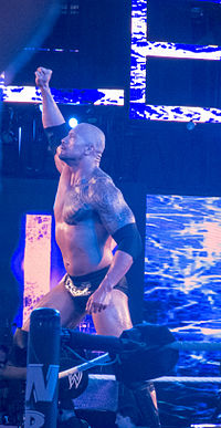 Signature pose of The Rock.