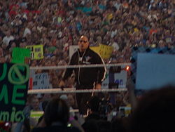 The Rock as host of WrestleMania XXVII.