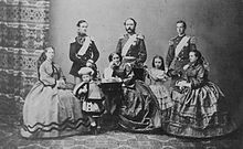 Christian IX of Denmark with his wife and their six children, 1862. Left to right: Dagmar, Frederick, Valdemar, Christian IX, Queen Louise, Thyra, George and Alexandra