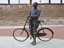 Statue of Elgar with bicycle in Hereford