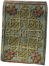 The Miroir or Glasse of the Synneful Soul, a translation from the French, by Elizabeth, presented to Catherine Parr in 1544. The embroidered binding with the monogram KP for "Katherine Parr" is believed to have been worked by Elizabeth.[20]