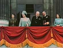 Princess Elizabeth (left) on the balcony of Buckingham Palace with (left to right) her mother Queen Elizabeth, British Prime Minister Winston Churchill, King George VI, and Princess Margaret, 8 May 1945