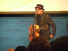 Costello performing in tribute to music legends Chuck Berry and Leonard Cohen who were the recipients of the first annual PEN Awards for songwriting excellence, at the JFK Presidential Library, in Boston, Massachusetts on 26 February 2012.