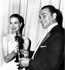 Receiving Oscar in 1956 for Marty, from Grace Kelly