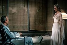James Stewart and Grace Kelly in Rear Window (1954)