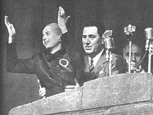 Eva Perón addresses the Peronists on 17 October 1951. By this point she was too weak to stand without Juan Perón's aid.