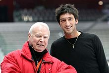 Lysacek with Frank Carroll, his coach since June 2003, at the 2007 Grand Prix Final where he won the bronze medal.