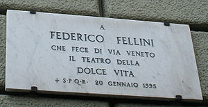 Dedicatory plaque to Fellini on Via Veneto, Rome: To Federico Fellini, who made Via Veneto the stage for the "Sweet Life" - SPQR - January 20, 1995