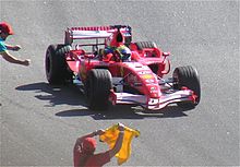 Massa celebrating victory at the 2006 Brazilian Grand Prix