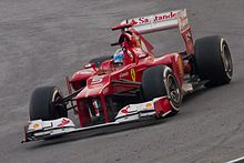 Alonso celebrates victory in the Malaysian Grand Prix
