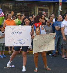 Signs of protest in the 2010 Cuban Day Parade in Union City, New Jersey, a heavily Cuban-American community.