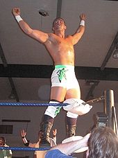 Kazarian posing on the turnbuckle before his match at a PWG show.