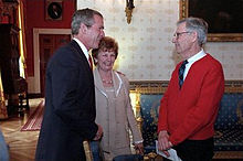 Rogers meeting with President George W. Bush in 2002.