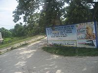 Billboard of Gabriel García Márquez in Aracataca. It reads: "I feel Latin American from whatever country, but I have never renounced the nostalgia of my homeland: Aracataca, to which I returned one day and discovered that between reality and nostalgia was the raw material for my work". —Gabriel García Márquez