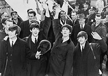 Harrison (third from left) with the other Beatles in New York City in 1964