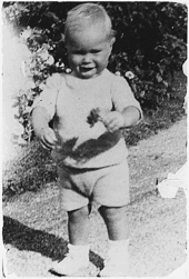 Young George H. W. Bush taking his first steps at his grandfather's house in Kennebunkport, Maine, c. 1925