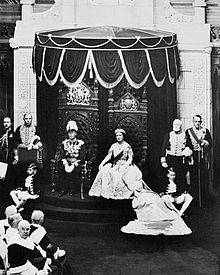 George VI grants Royal Assent to laws in the Canadian Senate, 19 May 1939. His consort, Queen Elizabeth, is to the right.