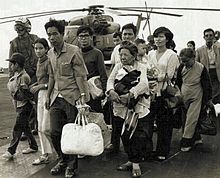 South Vietnamese refugees arrive on a U.S. Navy vessel during Operation Frequent Wind