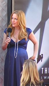 Anderson pregnant with her son Felix at the premiere of The X-Files: I Want to Believe, July 25, 2008