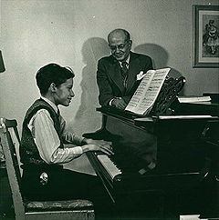 Glenn Gould with his teacher, Alberto Guerrero, demonstrating Guerrero's technical idea that Gould should pull down at keys instead of striking them from above. The photo was taken in 1945, before Gould fully developed this technique.