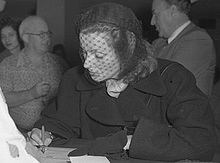Garbo signing her US citizenship papers, in 1950