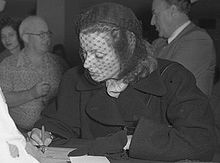 Garbo signing her US citizenship papers, in 1950