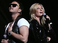 Guy Sebastian and Olivia Newton-John performing "Summer Nights" at the Olivia Newton-John & Friends Concert