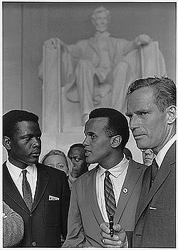 Belafonte (center) at the 1963 Civil Rights March on Washington, D.C with Sidney Poitier (left) and Charlton Heston.