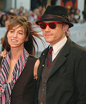 Heath Ledger posing with Charlotte Gainsbourg at the 64th Venice Film Festival in 2007.