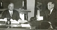 Herbert Hoover in the Oval Office with Ted Joslin. 1932