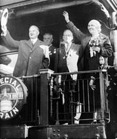 Herbert and Lou Henry Hoover aboard a train in Illinois.