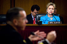 Senator Clinton listens as Chief of Naval Operations Navy Admiral Mike Mullen responds to a question during his 2007 confirmation hearing with the Senate Armed Services Committee.