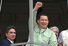 A triumphant Hugo Chávez visiting Porto Alegre, Brazil in 2003.