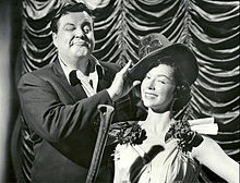 Gleason and June Taylor dancer Margaret Jeanne get ready for St. Patrick's Day 1955