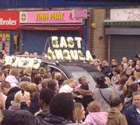 A car in Goody's funeral procession with East Angula (sic) spelt out in flowers in The Blue market, Bermondsey, London
