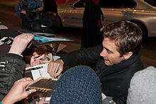 Gyllenhaal signing photographs at the 62nd Berlin International Film Festival in 2012