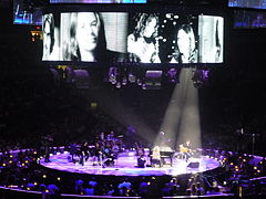 Taylor and Carole King performing "You've Got a Friend" together during their Troubadour Reunion Tour in 2010.