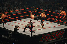 Jeff Hardy performing a low dropkick on Umaga in a tag-team match during 2007