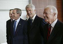 4 U.S. Presidents. Former President Carter (right), walks with, from left, George H.W. Bush, George W. Bush and Bill Clinton during the dedication of the William J. Clinton Presidential Center and Park in Little Rock, Arkansas on November 18, 2004