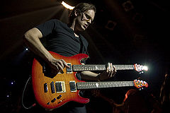 Bonamassa performing on a double necked guitar in Madrid, Spain on June 2, 2009