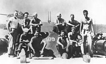 Lieutenant (junior grade) John F. Kennedy (standing at right) with his PT-109 crew