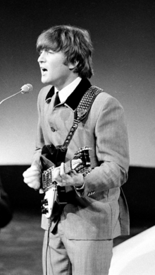Lennon performing with the Beatles in 1964.