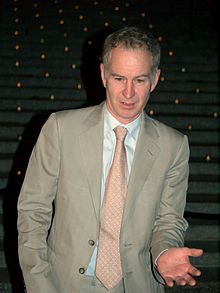 McEnroe demonstrating his swing at a Vanity Fair party in New York City.