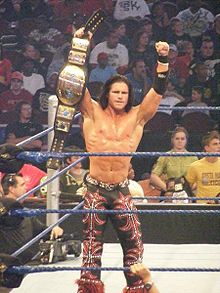 Hennigan after winning the WWE Intercontinental Championship for the first time as John Morrison, and third time overall.